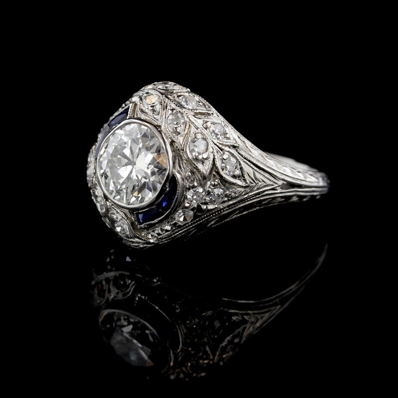 Art_Deco_Platinum_Diamond_and_Synthetic_Sapphire_Ring.jpeg