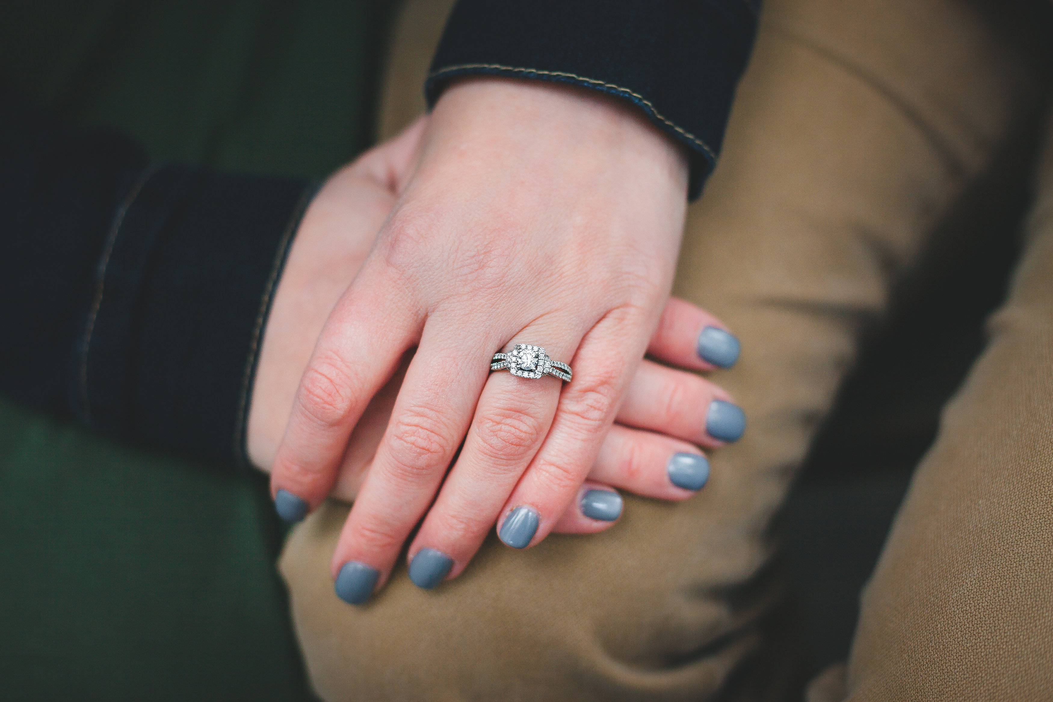 Engagement ring selfie ideas can always be simple and straightforward, showing your ring and clasped hands.