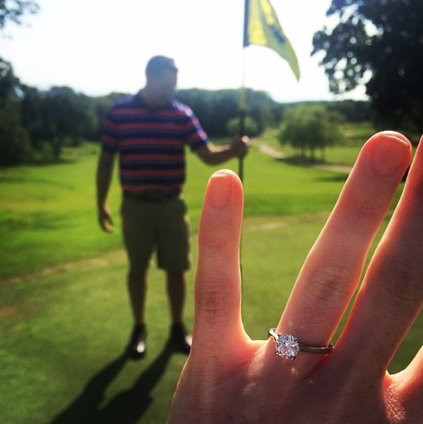 An instagram engagement announcement idea: the classic ring selfie.